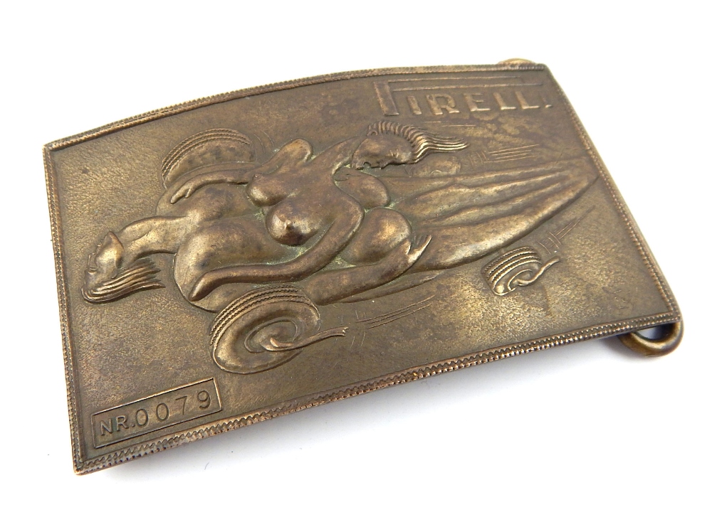 Pirelli brass belt buckle after a design by Salvador Dali, with erotic scene, the reverse marked ''