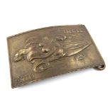 Pirelli brass belt buckle after a design by Salvador Dali, with erotic scene, the reverse marked ''