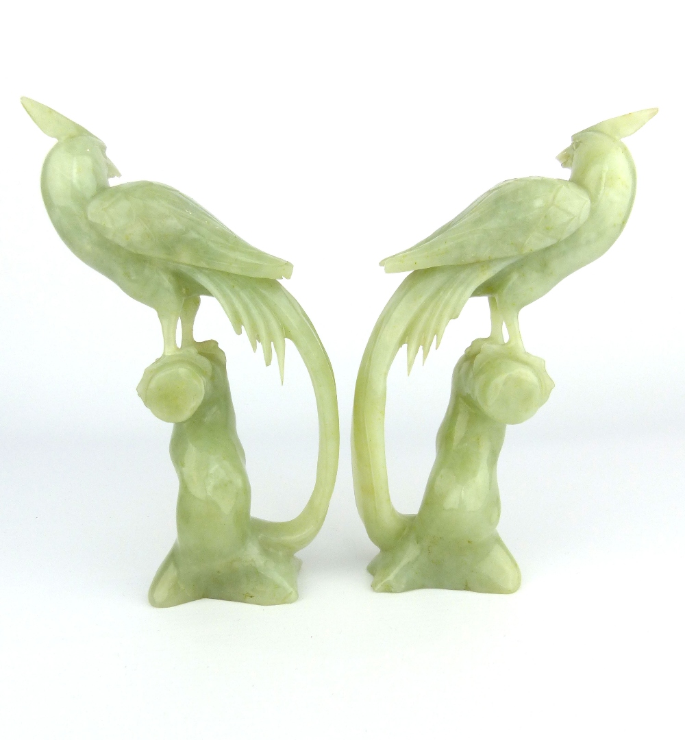 A pair of Chinese carved celadon jade phoenix birds perched on tree stumps, circa 1900s, 14cm - Image 3 of 5