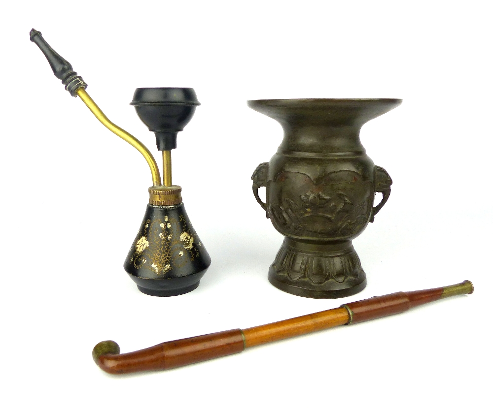 Chinese bronze opium pipe, a turned wood pipe and a small bronze vase decorated with birds among