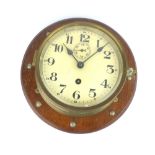 Mid 20th century brass bulkhead eight day wall timepiece with subsiduary seconds, dial marked Arabic