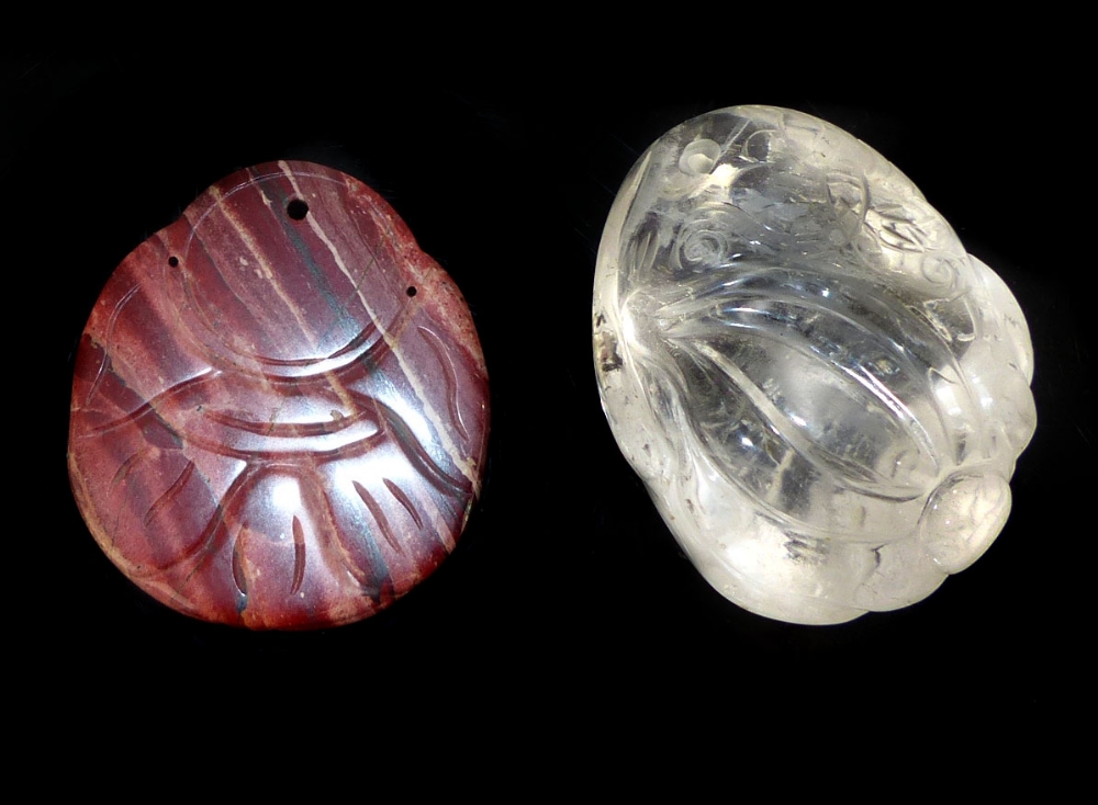 A rare Chinese carved rock crystal medallion of a pumpkin plant, sold with a striated jasper - Image 2 of 2