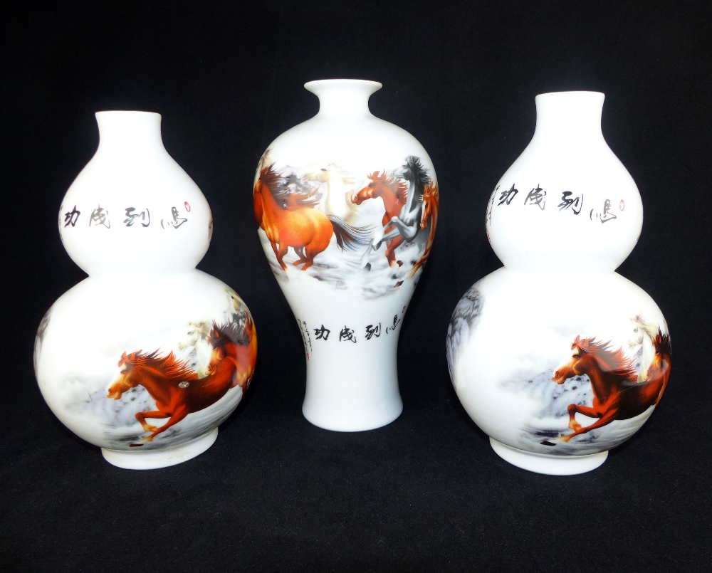 A garniture of three Chinese porcelain vases decorated with the eight horses of Wang Mu, - Image 6 of 6