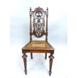 Carolean style carved oak hall chair, floral and acanthus carved back, rattan seat, turned and