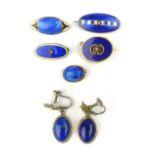 Two continental silver and enamel brooches, silver lapis lazuli earrings and two other brooches.