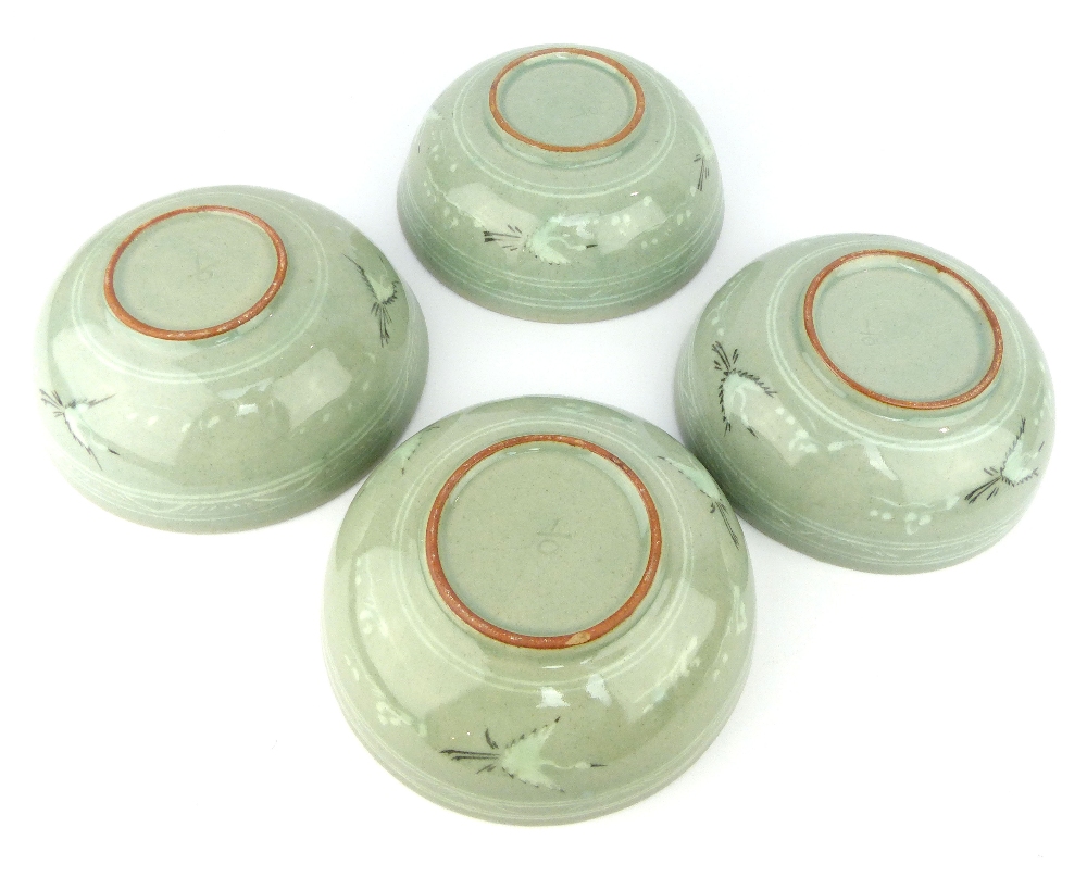 A set of four Korean porcelain footed bowls, the crackle celadon glazed bodies decorated with frieze - Image 4 of 4