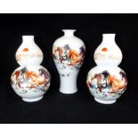 A garniture of three Chinese porcelain vases decorated with the eight horses of Wang Mu,