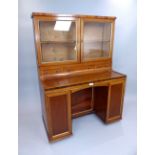 Mid 19th century rosewood banded, brass inlaid kneehole cabinet adapted from a piano, the glazed