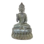Sino Tibetan cast metal Buddha, depicted in the lotus position on oval plinth, 30 cm H.