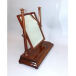 Victorian mahogany toilet mirror with rectangular plate on ogee platform base, 78 cm H