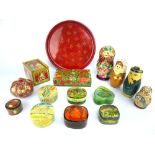 Collection of fifteen Russian, Indian and Eastern papier mache boxes and carved wood souvenir