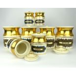 Set of eight Robert Stewart kitchen storage jars, gilded decoration, circa 1970s, largest 14cm h.