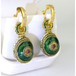Pair of green enamel decorative earrings of Persian influence.