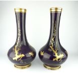 Pair of late 19th century Minton vases, of baluster form with narrow necks,