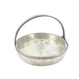 Liberty's Tudric planished pewter hors d'oeuvres dish with four glass liners, 23cm diam.