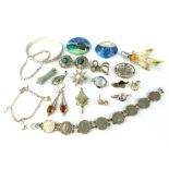 Collection of assorted silver / white metal jewellery to include enamel brooches,