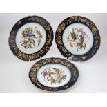 Three series cabinet plates, fluted rim, gilded decoration,