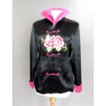 20th century Chinese black silk jacket, with cerise collar and cuffs,