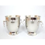 Pair of plated wine coolers with ring handles.