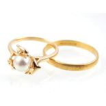 14ct yellow gold dress ring, set with a natural pearl encircled by dolphins and an 18ct yellow