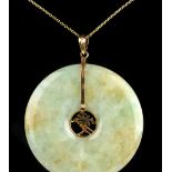 Chinese jade disc pendant, 14 ct yellow gold mounted on a fine link chain.