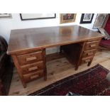 Oak desk, circa 1950, six drawers with slides, 154 x 86cm.