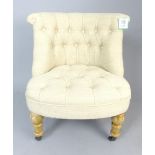 Contemporary button back bedroom chair, turned and limed feet.