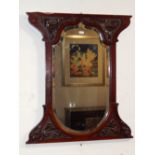 Edwardian caved mahogany framed mirror, with a rectangular shaped bevelled plate, 69cm h