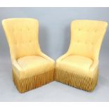 A pair of Victorian style upholstered spoon button back low seat chairs, covered in a yellow
