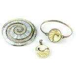 Sterling silver, mother of pearl and white stone swirl pattern brooch, a silver and sea shell