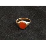 Asprey & Co a 9ct yellow gold and oval carnelian signet ring.