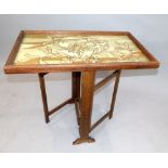 Early 20th century tilt top table, the rectangular folding top incorporating a tapestry panel, 78cm