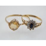 Sapphire and diamond dress ring, claw set in a 9ct gold band, together with a citrine dress ring