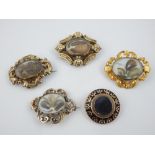Memoriam brooches, one with Queen's Crown, round black enamel and others. (5)