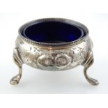 Victorian silver salt dish, blue glass liner, floral decoration, hoof feet, London 1872, 5.8cm dia.