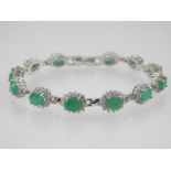 Silver green stone bracelet, set oval faceted stones.