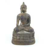 South east Asian cast bronze seated, 15cm h.