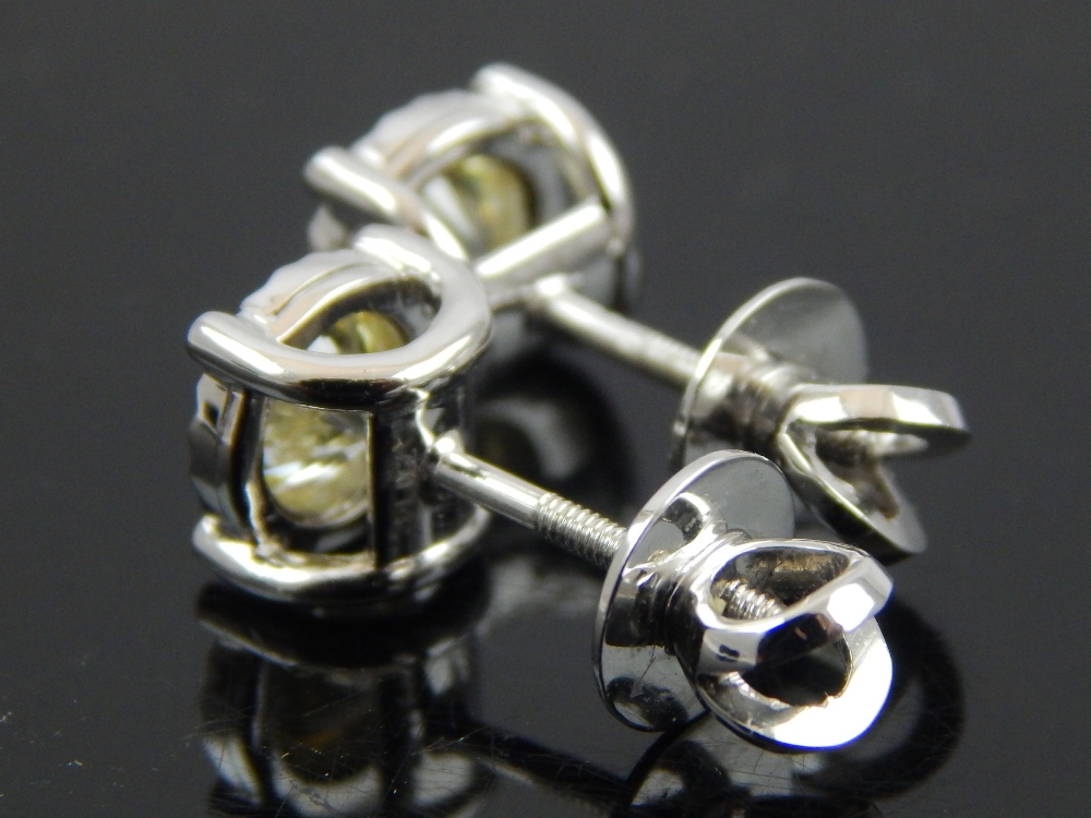 Pair of 18ct white gold diamond solitaire ear studs total weight, 1.42ct. - Image 2 of 2