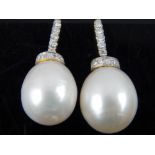 Pair of 18ct white gold diamond and cultured pearl earrings.