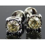 Pair of 18ct white gold diamond solitaire ear studs total weight, 1.42ct.
