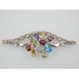 Contemporary silver and multi gemstone bracelet with open geometric links