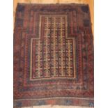 Baluch rug, of geometric design with stepped medallion to centre over red, cream and blue ground,