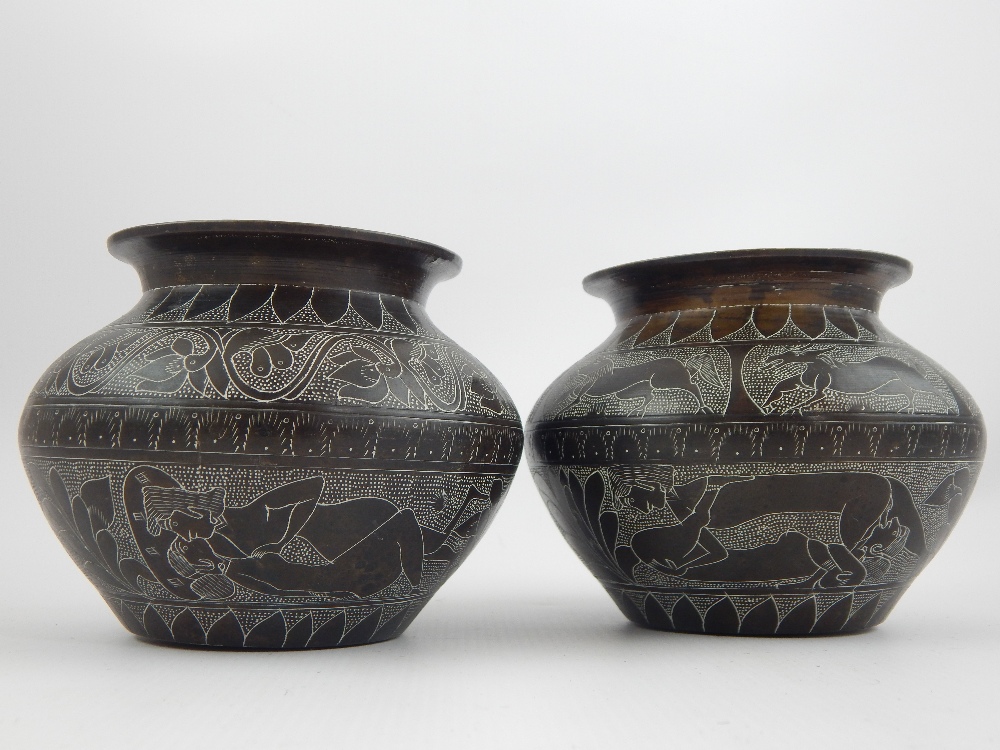 After the antique, a pair of Middle Eastern, possibly Syrian,