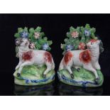 Pair of 19th C Staffordshire recumbent rams with floral bocage and painted detail, 11cm.