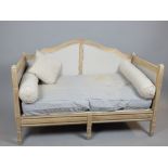 Limed oak continental sofa, camel back, leaf finials, box sides, tapering box legs,