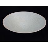 Chinese celadon bowl, raised foliate decoration to interior.