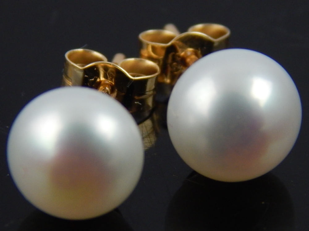 Pair of 9ct yellow gold pearl ear studs.