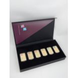 Boxed set of six London Olympic gold plated ingots.