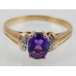 10ct yellow gold amethyst and diamond ring.