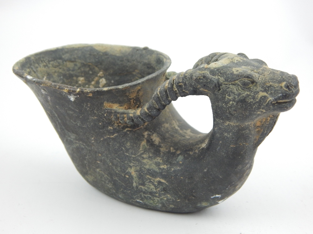 Chinese bronze cup with goat head handle, with character marks to base 13.5cm l.